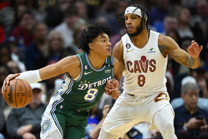 Mar 4, 2023; Cleveland, Ohio, USA; Detroit Pistons guard Jared Rhoden (8) drives against Cleveland Cavaliers forward Lamar Stevens (8) in the fourth quarter at Rocket Mortgage FieldHouse. Mandatory Credit: David Richard-USA TODAY Sports